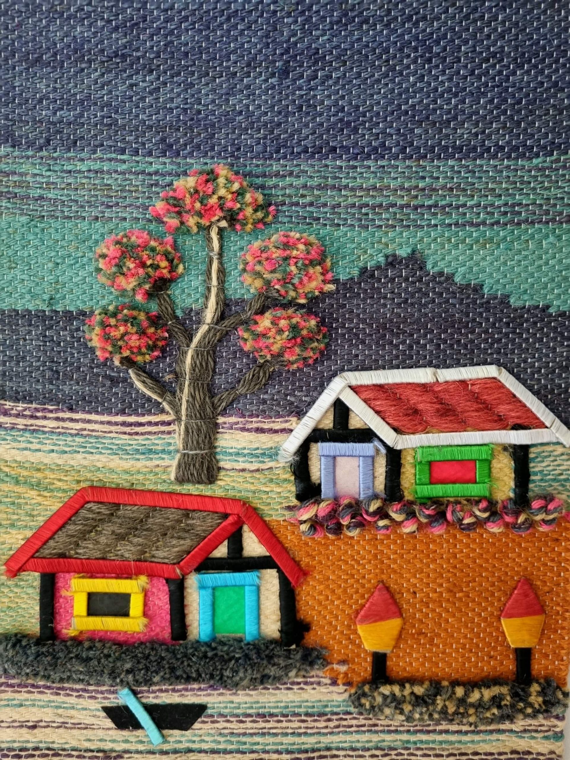 Knitted home with trees